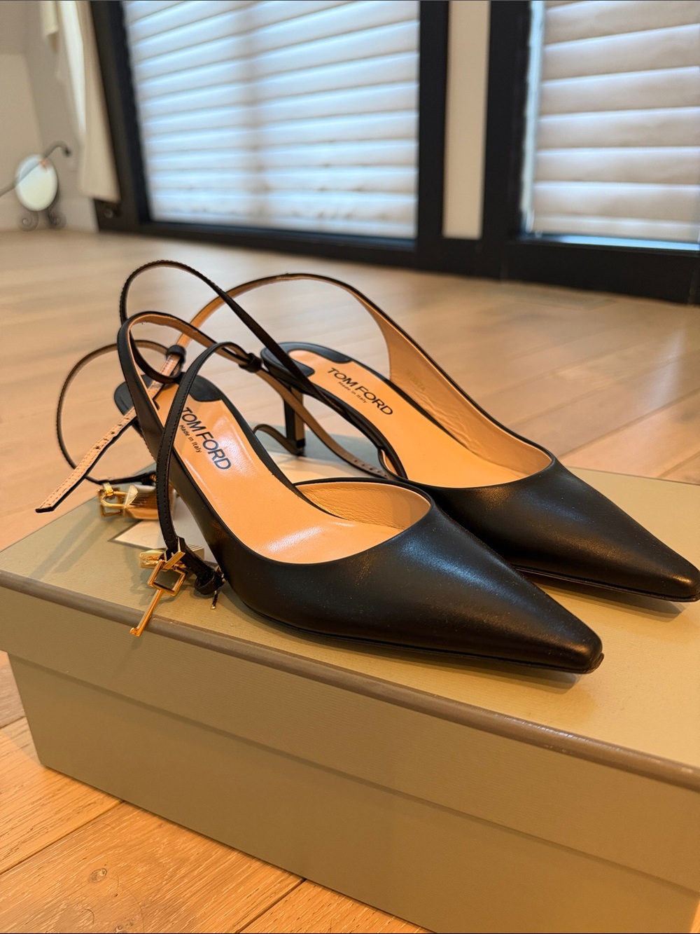 Tom Ford Black Leather Pointed Slingback Pumps with Gold Accents